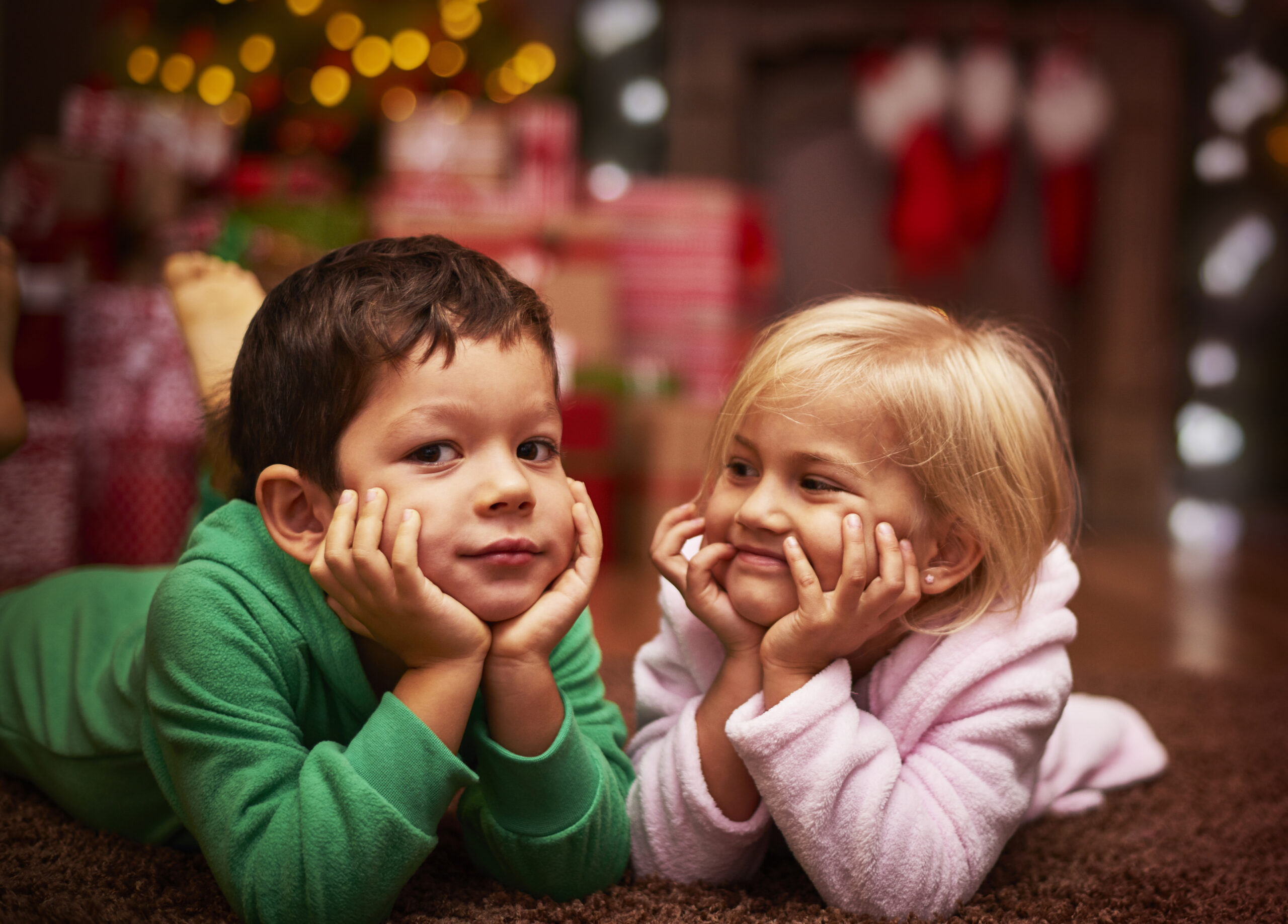 Cute siblings spenting their christmas time together